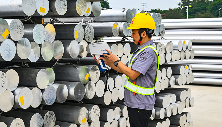 LANScientific LIBS analyzer in use on metal billets in a storage yard